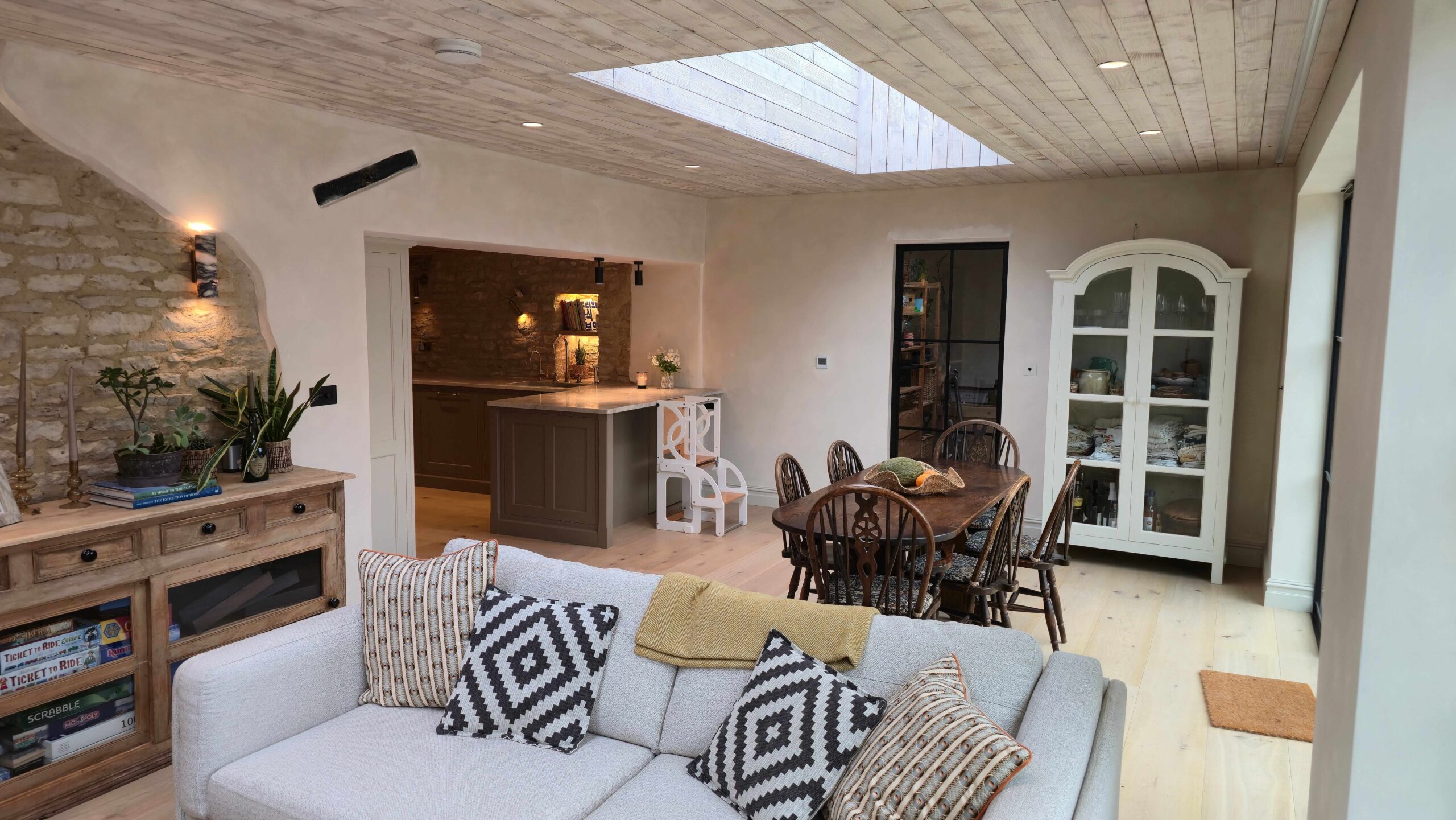 Heritage property renovation in the Cotswolds - beautiful dining area with skylight and oak flooring